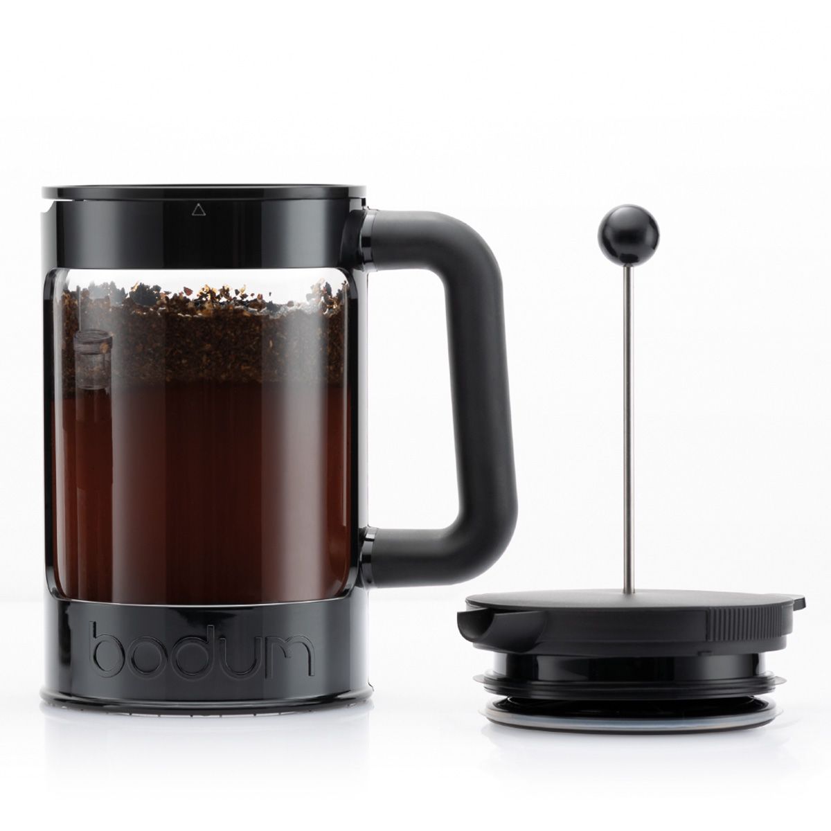 Black coffee maker with glass container and handle on a white background Black coffee maker with glass container and handle on a white background