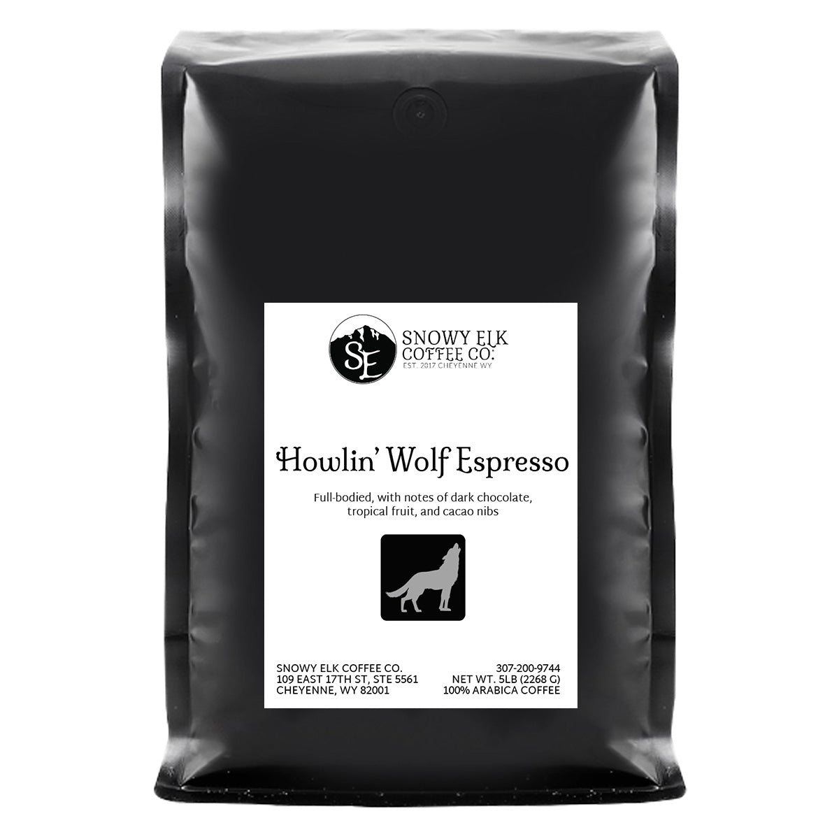 A bag of Snowy Elk Coffee Co. Howlin' Wolf Espresso with a label showing a silhouette of a wolf and mountains. A bag of Snowy Elk Coffee Co. Howlin' Wolf Espresso with a label showing a silhouette of a wolf and mountains.