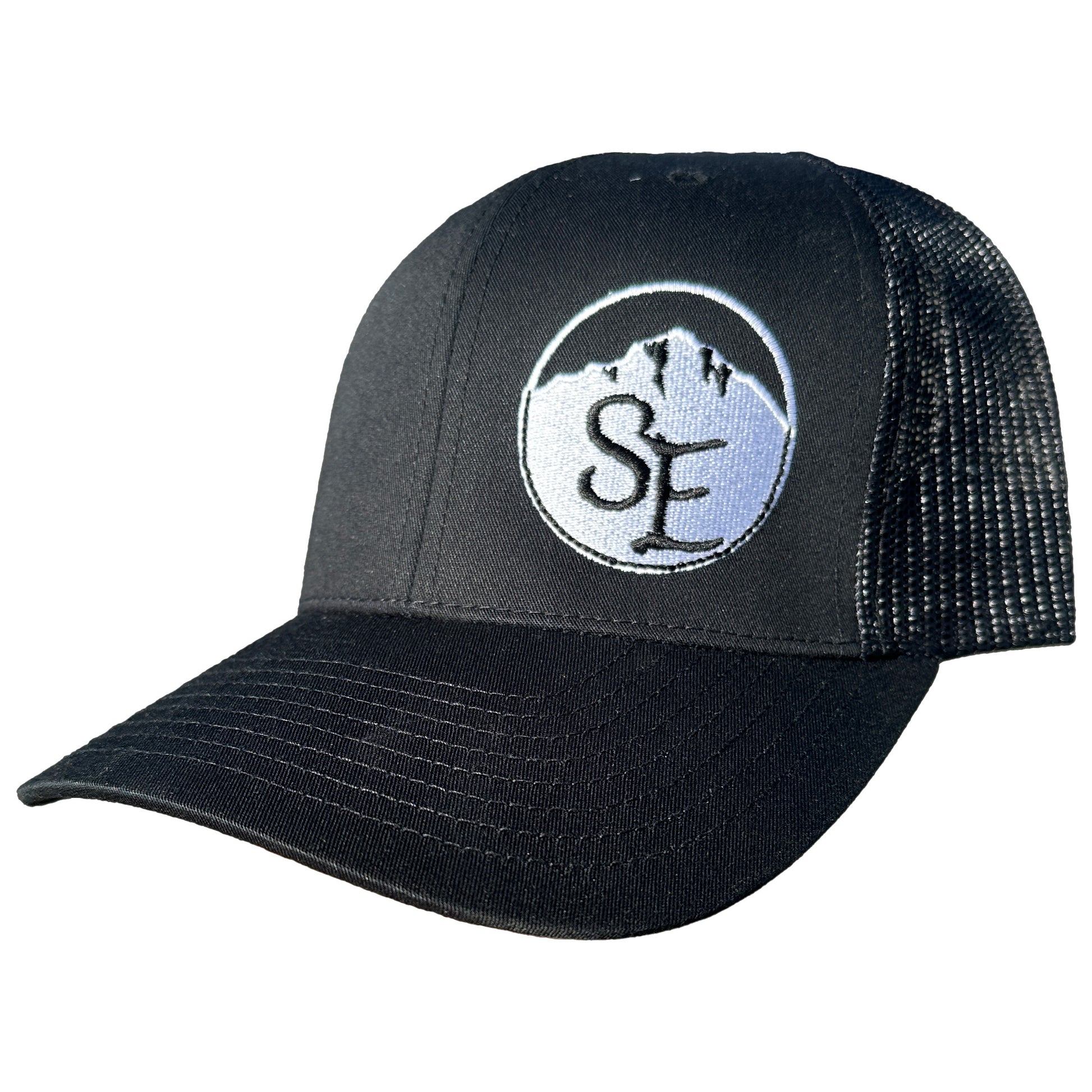A black trucker hat with a mesh back and an adjustable snapback closure. The hat features a logo on the front panel.