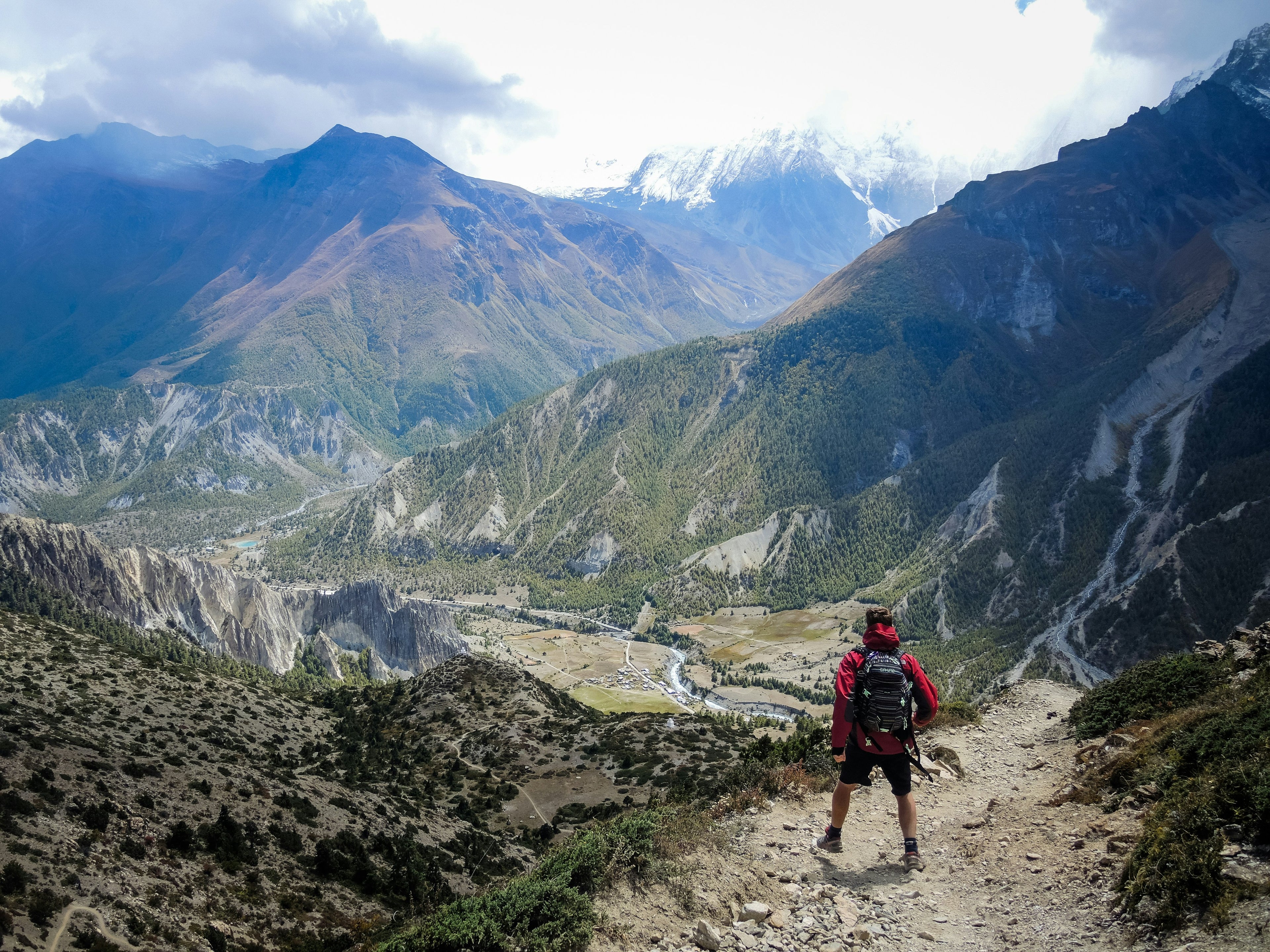 Stock image of man viewing mountain landscape