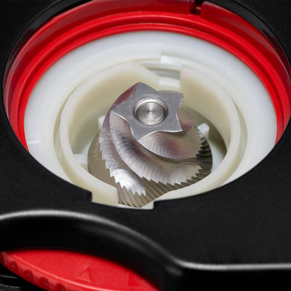 The inside of the burr grinder showing the burrs