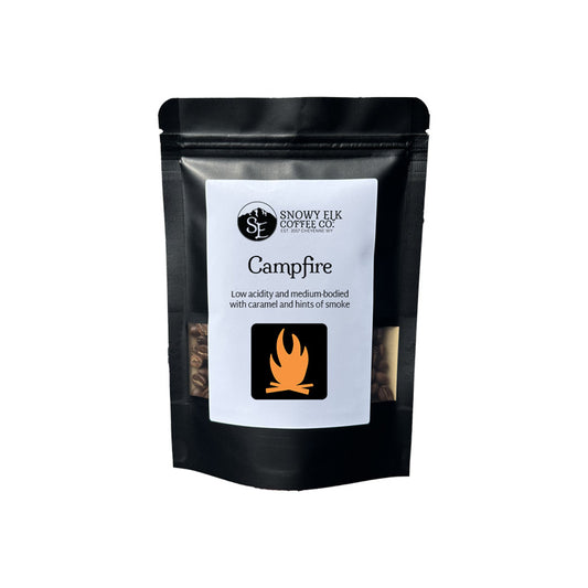 Black coffee packaging with 'Snowy Elk Coffee Co.' label on a white background Black coffee packaging with 'Snowy Elk Coffee Co.' label on a white background