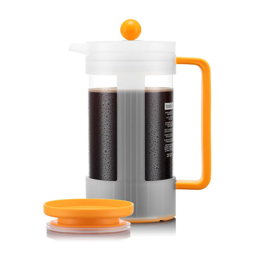 French press coffee maker with orange handle and lid on a white background