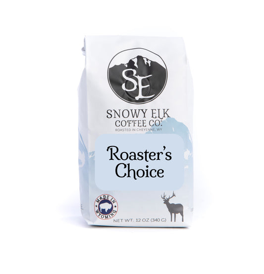 A bag of Snowy Elk Coffee Co. Roaster's Choice coffee, showing the brand logo, the product name, and the net weight.