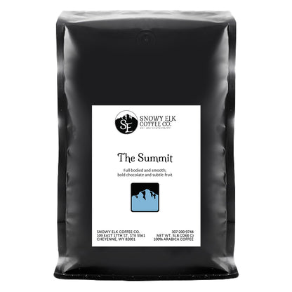 Packaging of Snowy Elk Coffee Co., featuring 'The Summit' dark roast coffee.