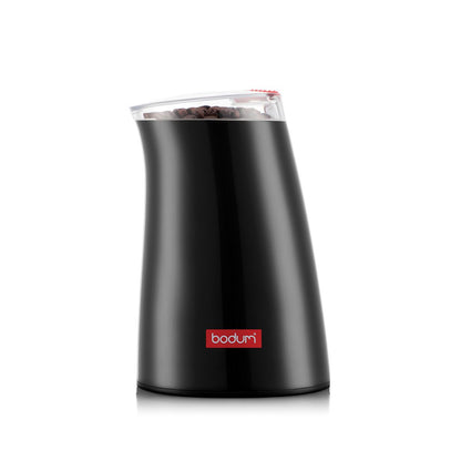 A black BODUM electric coffee blade grinder with a transparent lid, displaying the coffee beans inside.