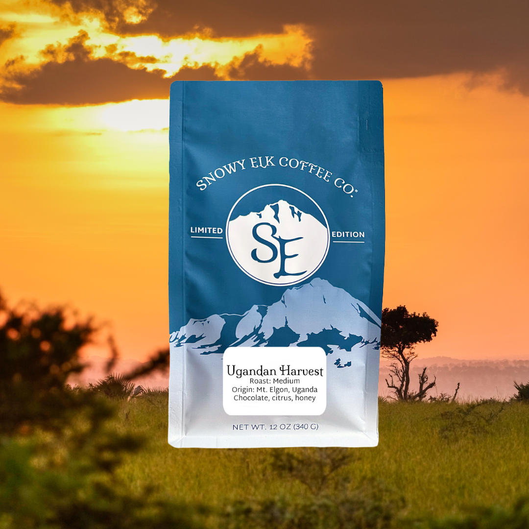 Snowy Elk Coffee Co. package with a sunset background